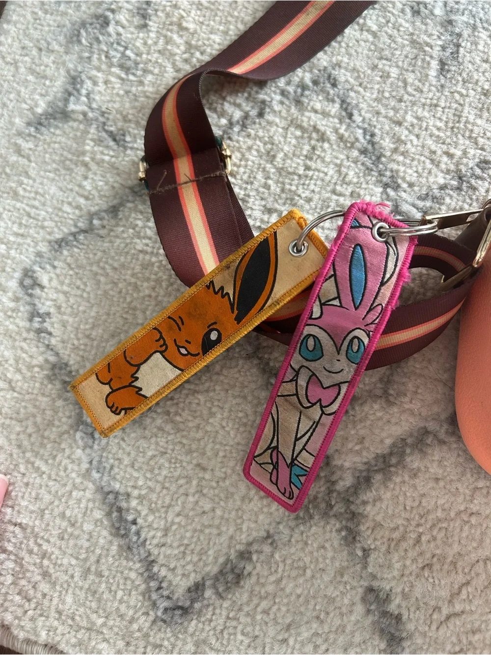 Bioworld Peach Crossbody Bag with Brown Stripe Strap